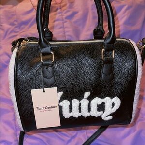 Juicy Couture Black and White Satchel with Bold Branding